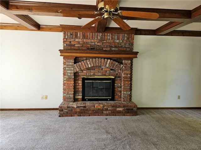 5806 N Kensington Ave, Kansas City, MO 64119 - detailed view of carpet flooring, beam ceiling, baseboards, and ceiling fan