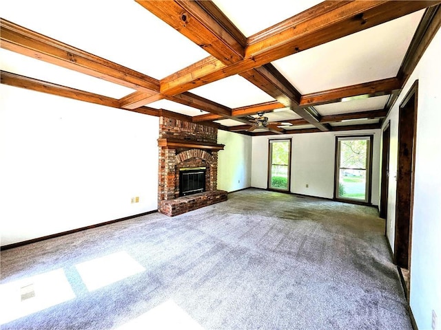 5806 N Kensington Ave, Kansas City, MO 64119 - unfurnished living room featuring carpet flooring, ceiling fan, beamed ceiling, coffered ceiling, and baseboards
