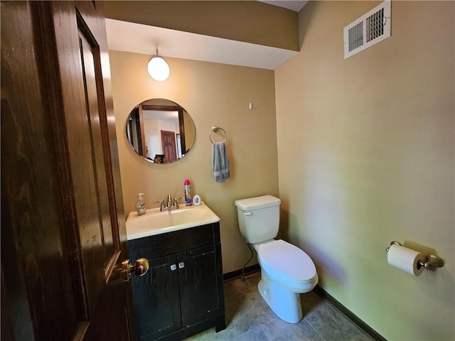 5806 N Kensington Ave, Kansas City, MO 64119 - half bath with toilet, baseboards, and vanity