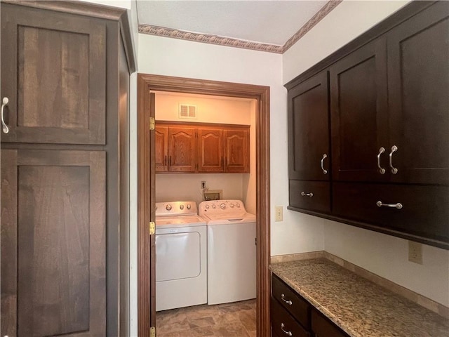 5806 N Kensington Ave, Kansas City, MO 64119 - laundry area featuring separate washer and dryer, cabinet space, and crown molding