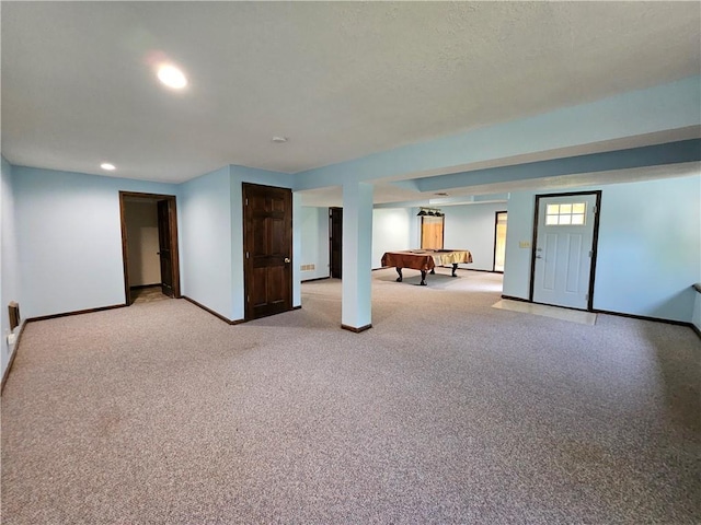 5806 N Kensington Ave, Kansas City, MO 64119 - basement with billiards table, baseboards, light carpet, and recessed lighting