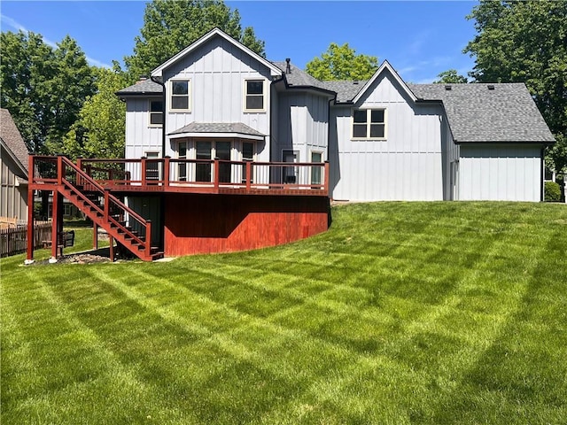 5806 N Kensington Ave, Kansas City, MO 64119 - rear view of house with a wooden deck, stairway, a shingled roof, and a yard