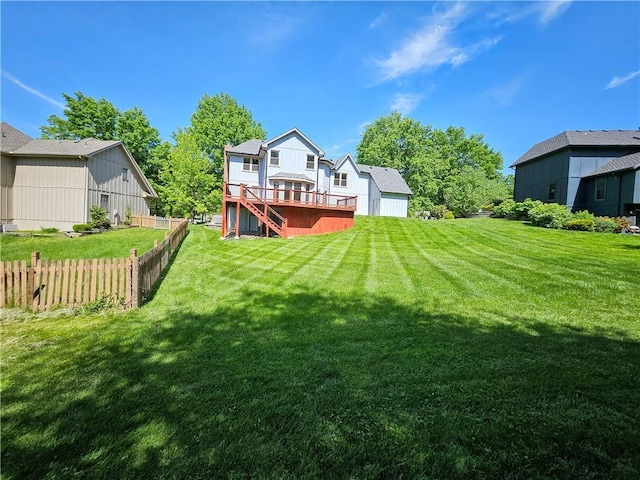 5806 N Kensington Ave, Kansas City, MO 64119 - rear view of house with stairway and a deck