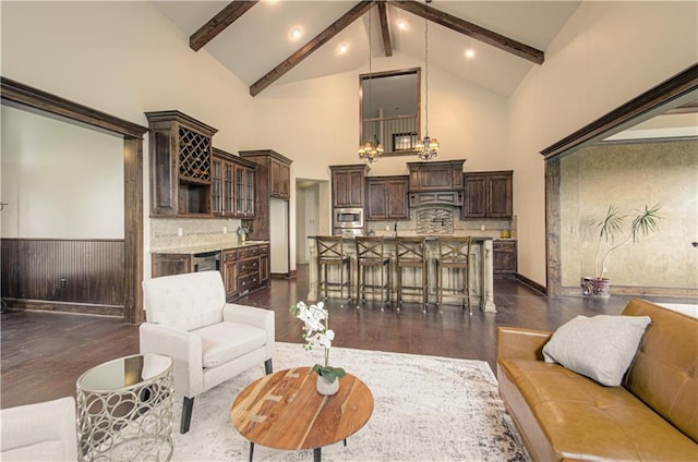 1110 Metfield Ln, Raymore, MO 64083 - living area featuring high vaulted ceiling, a chandelier, beamed ceiling, dark wood finished floors, and recessed lighting