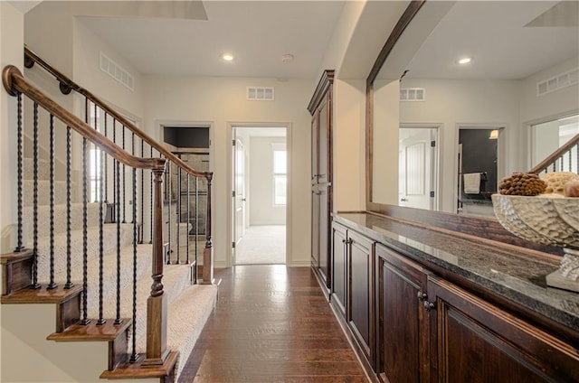 1110 Metfield Ln, Raymore, MO 64083 - foyer entrance with stairs, dark wood-type flooring, plenty of natural light, recessed lighting, and baseboards