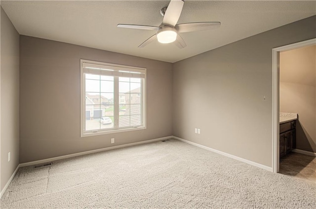 1110 Metfield Ln, Raymore, MO 64083 - carpeted spare room with a ceiling fan and baseboards