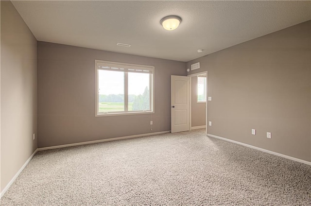 1110 Metfield Ln, Raymore, MO 64083 - carpeted spare room with baseboards