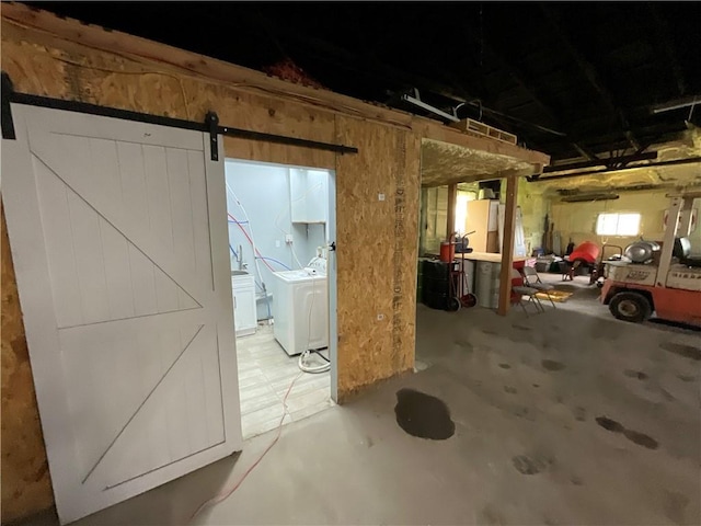 basement featuring a barn door