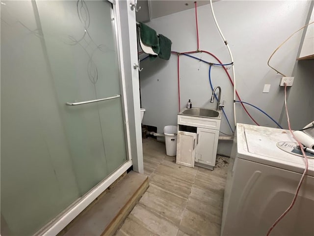 laundry room with washer / dryer