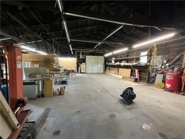 garage with a workshop area