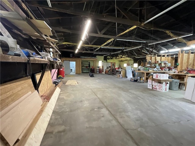 garage with a workshop area