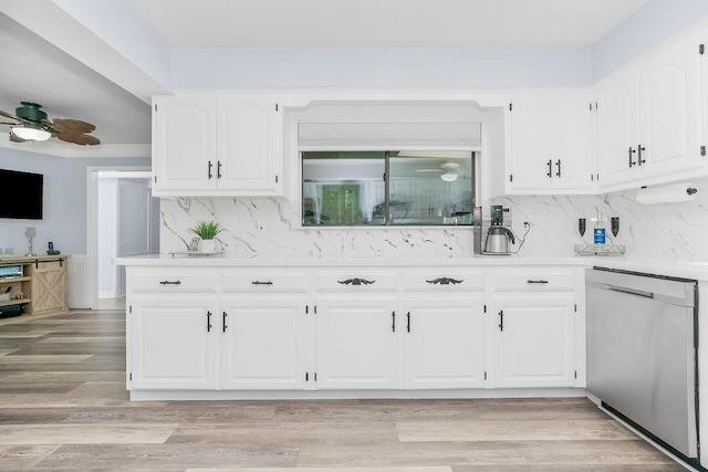 11506 Knox St, Overland Park, KS 66210 - kitchen featuring stainless steel dishwasher, a ceiling fan, light countertops, backsplash, and white cabinetry