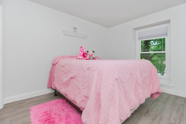 11506 Knox St, Overland Park, KS 66210 - bedroom with wood finished floors and baseboards