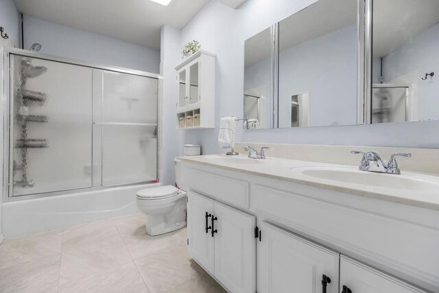11506 Knox St, Overland Park, KS 66210 - full bathroom with bath / shower combo with glass door and double vanity