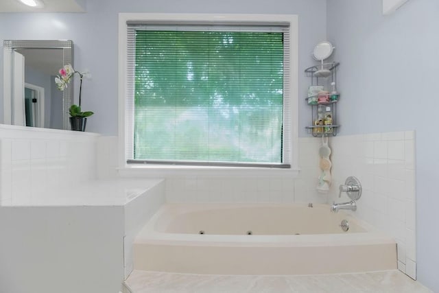 11506 Knox St, Overland Park, KS 66210 - bathroom with plenty of natural light and a whirlpool tub