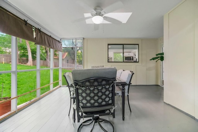 11506 Knox St, Overland Park, KS 66210 - sunroom featuring a ceiling fan and healthy amount of natural light