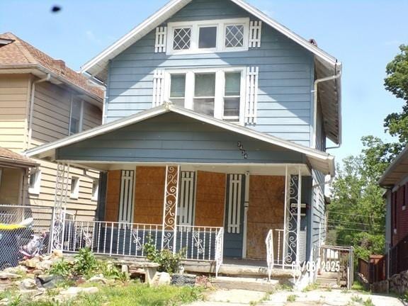 view of front of property featuring covered porch
