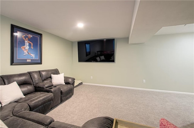 carpeted living area featuring baseboards