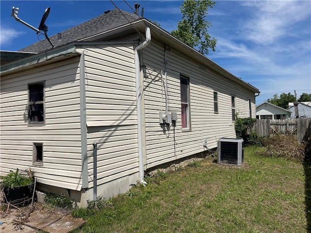 view of home's exterior with cooling unit