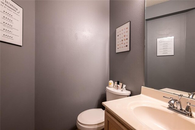 8008 NE Elmwood Ave, Kansas City, MO 64119 - half bathroom with toilet and vanity