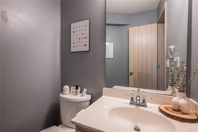 8008 NE Elmwood Ave, Kansas City, MO 64119 - bathroom with vanity and toilet