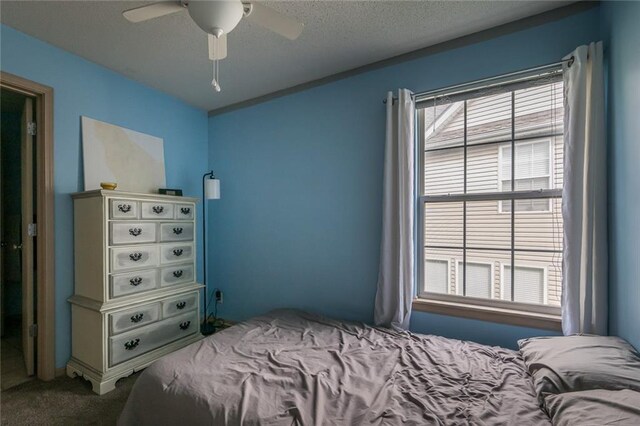 8008 NE Elmwood Ave, Kansas City, MO 64119 - carpeted bedroom featuring a ceiling fan
