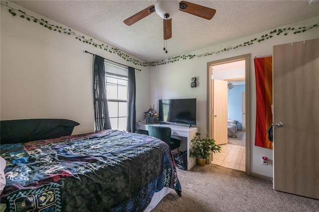 8008 NE Elmwood Ave, Kansas City, MO 64119 - bedroom with a textured ceiling, carpet flooring, and ceiling fan