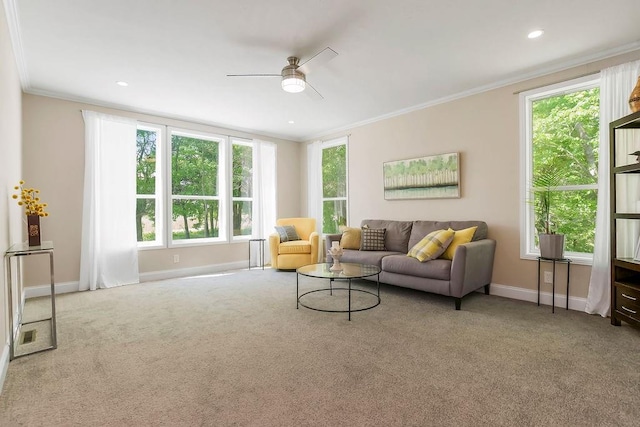 85 Birdie Ln, Mound City, KS 66056 - carpeted living room with ornamental molding, ceiling fan, baseboards, and recessed lighting