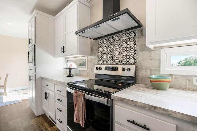 85 Birdie Ln, Mound City, KS 66056 - kitchen featuring stainless steel range with electric cooktop, range hood, backsplash, and dark wood-style floors
