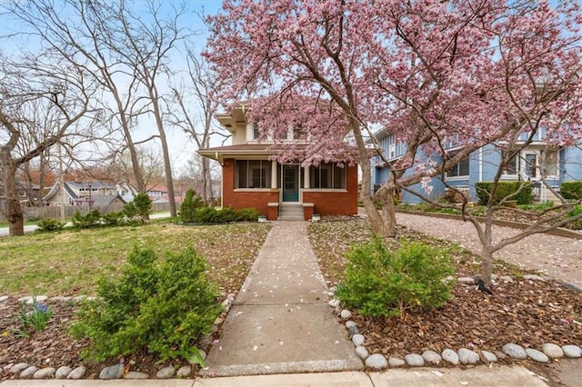 18 W 61st Ter, Kansas City, MO 64113 - view of property hidden behind natural elements with brick siding and fence