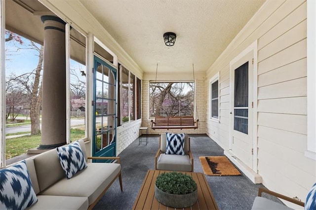 18 W 61st Ter, Kansas City, MO 64113 - sunroom with an outdoor living space