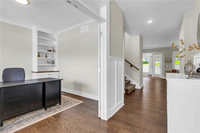 home office featuring dark wood-style flooring, built in features, recessed lighting, and baseboards