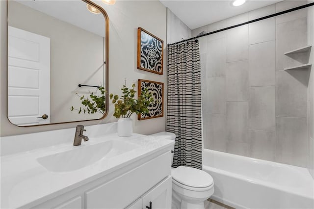 full bathroom with toilet, vanity, and shower / tub combo