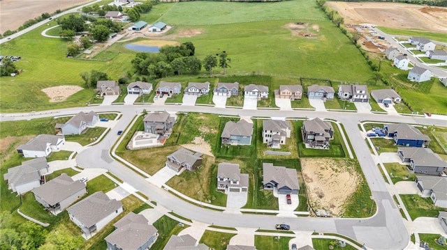 aerial view of property's location featuring nearby suburban area