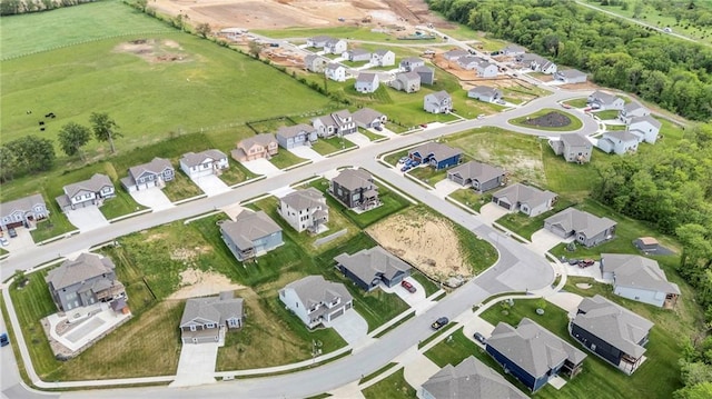 aerial view of property's location featuring nearby suburban area