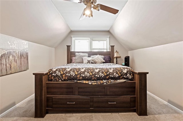 carpeted bedroom with lofted ceiling, ceiling fan, and baseboards