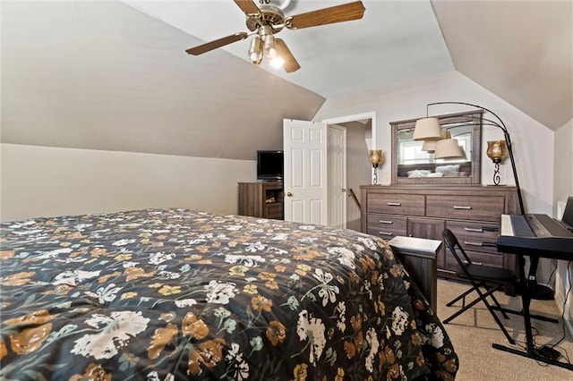 bedroom featuring lofted ceiling, light colored carpet, and ceiling fan