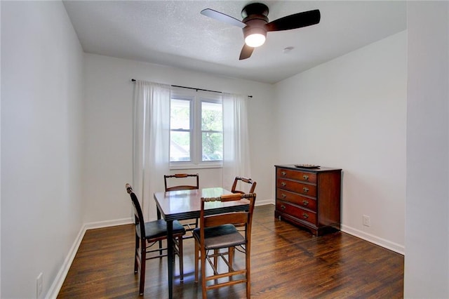81 S Street S, St, Lake Lotawana, MO 64086 - dining room with dark wood-type flooring, a ceiling fan, and baseboards