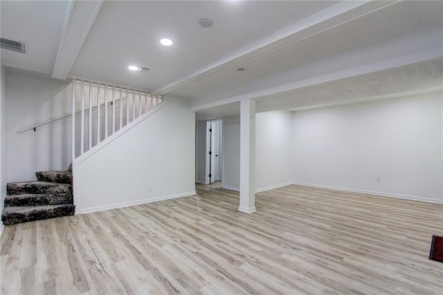 81 S Street S, St, Lake Lotawana, MO 64086 - finished basement with wood finished floors, stairway, recessed lighting, and baseboards