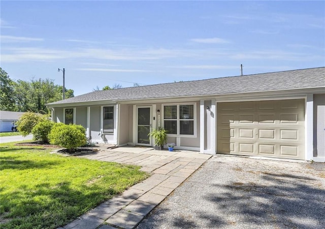 single story home with a garage, a front lawn, asphalt driveway, stucco siding, and roof with shingles