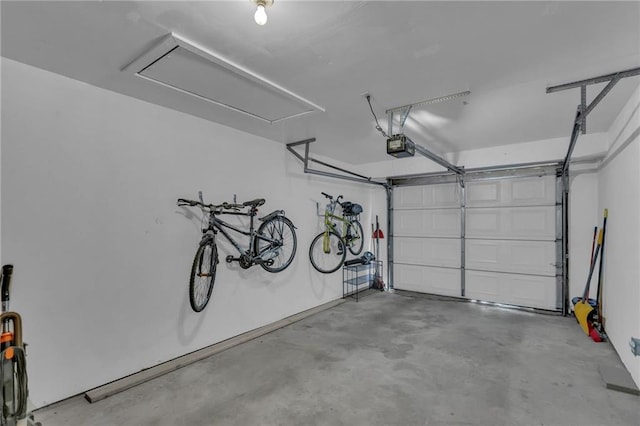 garage featuring a garage door opener