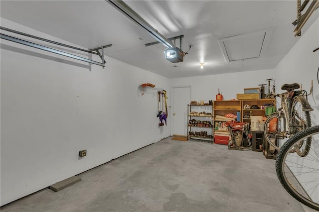 garage featuring a garage door opener