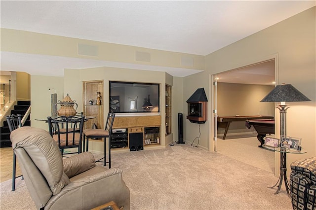 5445 NE Northgate Xing, Lees Summit, MO 64064 - carpeted living area with billiards, stairs, and baseboards