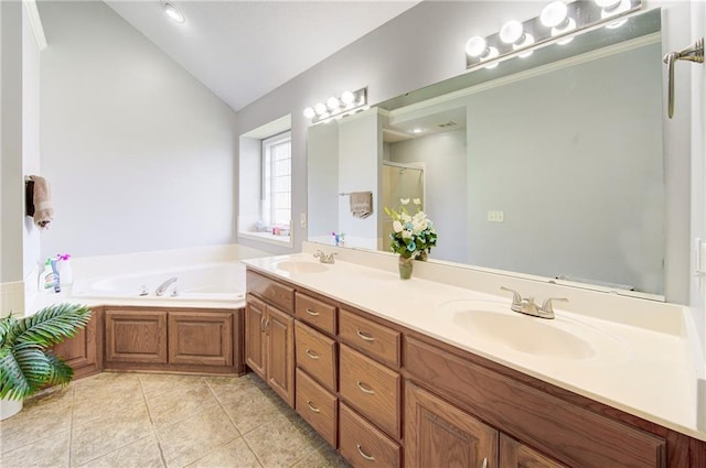 bathroom featuring vaulted ceiling, a garden tub, a stall shower, double vanity, and tile patterned floors