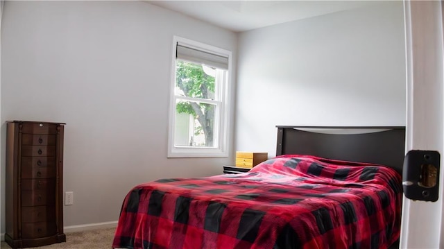 708 Cantebury Dr, Warrensburg, MO 64093 - bedroom featuring carpet and baseboards