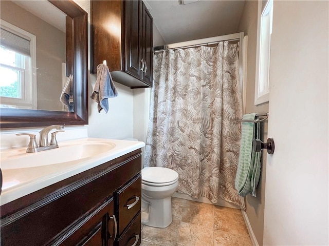 708 Cantebury Dr, Warrensburg, MO 64093 - full bath with vanity, toilet, and curtained shower