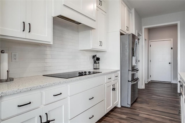 4713 NE Saratoga Ct, Lees Summit, MO 64064 - kitchen with stainless steel refrigerator with ice dispenser, black electric stovetop, and white cabinets