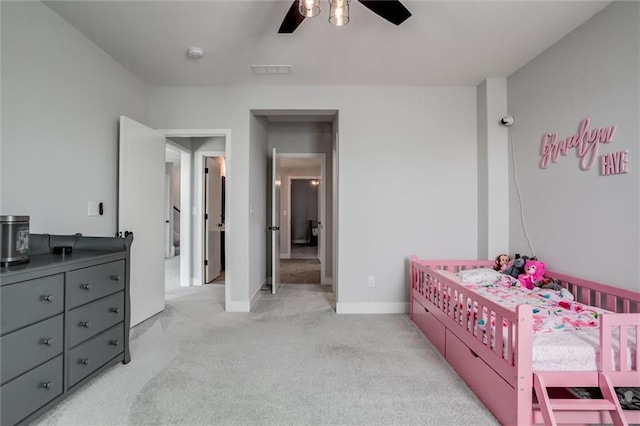 4713 NE Saratoga Ct, Lees Summit, MO 64064 - bedroom with light colored carpet, baseboards, and a ceiling fan