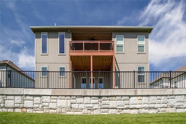 4713 NE Saratoga Ct, Lees Summit, MO 64064 - rear view of property featuring a balcony