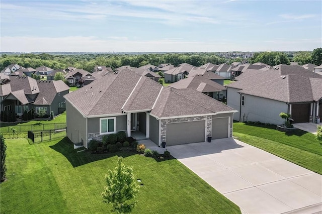 4713 NE Saratoga Ct, Lees Summit, MO 64064 - view of front of house featuring a garage, stone siding, a residential view, and concrete driveway
